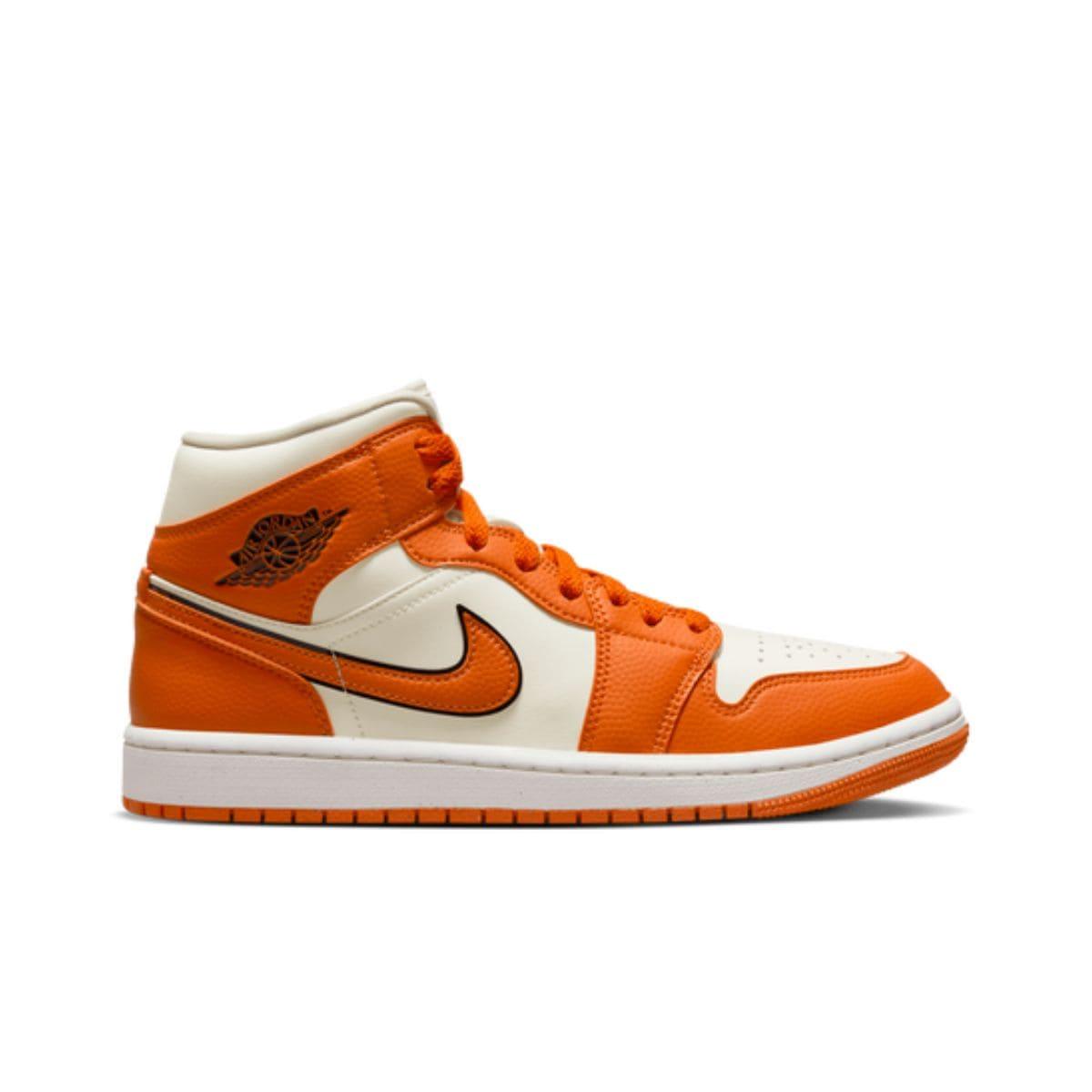 Jordans with Orange replacement laces by Kicks Shoelaces