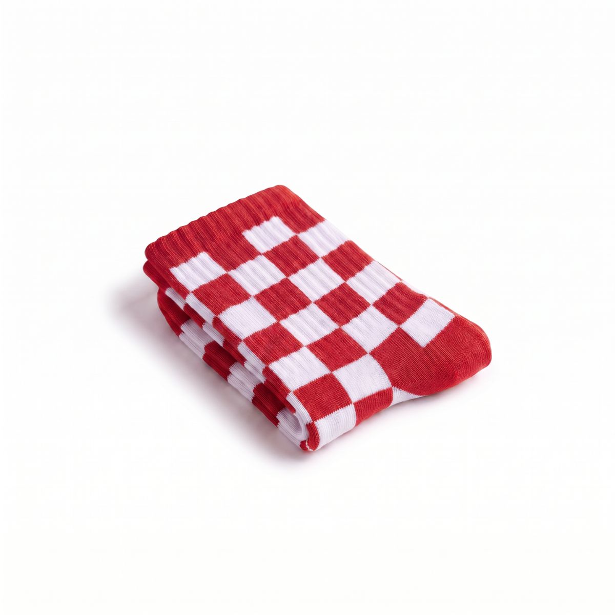 Folded red and white checkered crew sock highlighting pattern detail