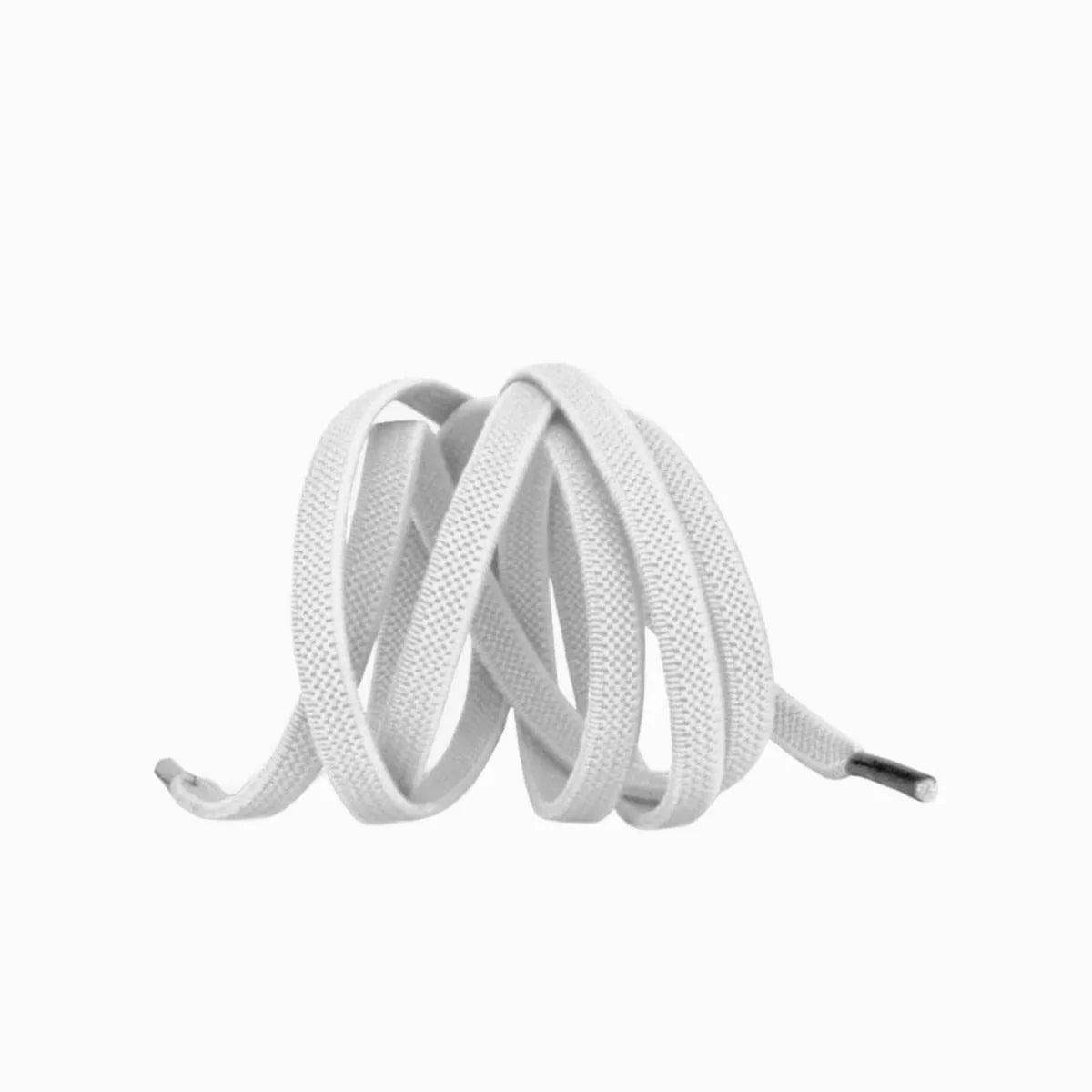 White elastic no-tie shoelaces with a buckle lock system installed on sneakers for a secure slip-on fit without tying the laces, by Kicks Shoelaces.